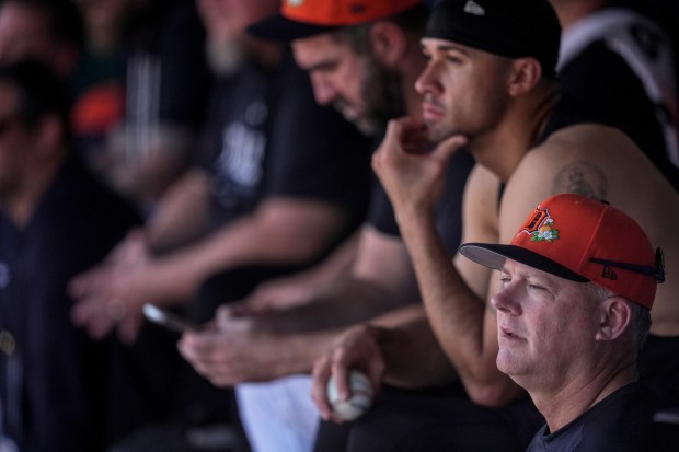 Detroit Tigers manager A.J. Hinch, right, watches batting practice during workouts at spring training baseball, Friday, Feb. 20, 2026, in Lakeland. (AP Photo/Mike Stewart)