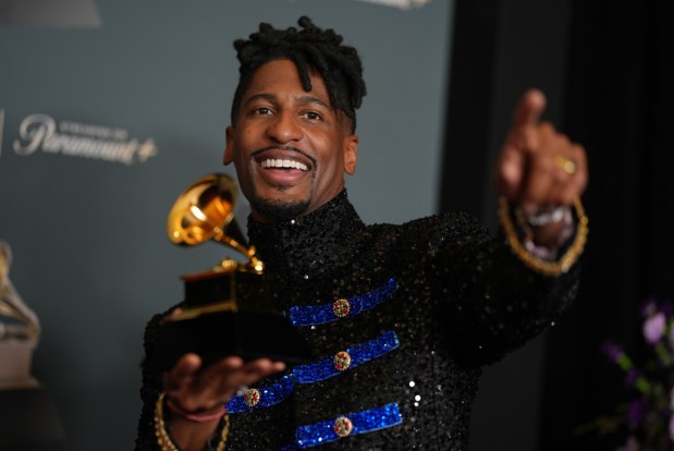 Jon Batiste poses in the press room with the award for best Americana album for "Big Money" during the 68th annual Grammy Awards on Sunday, Feb. 1, 2026, in Los Angeles. (Photo by Richard Shotwell/Invision/AP)
