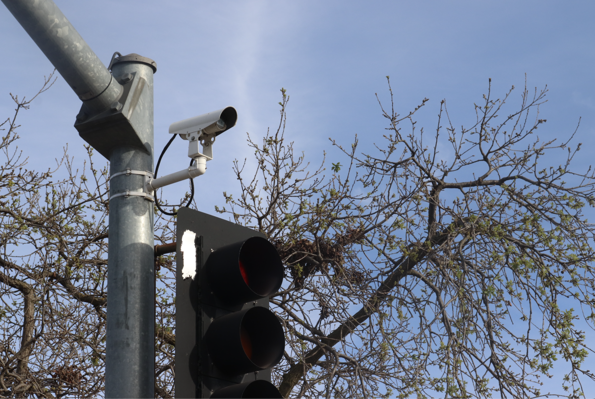 One of Santa Clara County’s many security cameras sits atop a street light in Palo Alto. “We would like the city to just turn them off until we can be 100% sure that the data is not being used in a way that it wasn’t designed,” Palo Alto Neighborhoods Association co-chair Rebecca Sanders said.