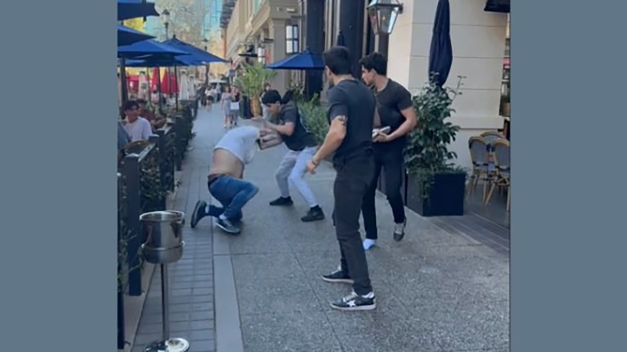 A video shows three men assaulting Israeli American Lior Zeevi, 48, on Santana Row in San Jose on Sunday. (Courtesy of Keanu Kahrobaie)