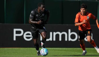 Alameda Post - An Oakland Roots player dribbles the ball in a match against Orange County SC.