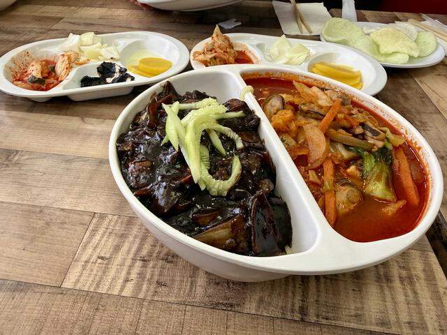 La Riviera's Smile Market 2 serves up a house combo of jajangmyeon, noodles dressed in black bean sauce, and jampong, a spicy seafood noodle soup, for $18.95 on Saturday, Feb. 28.