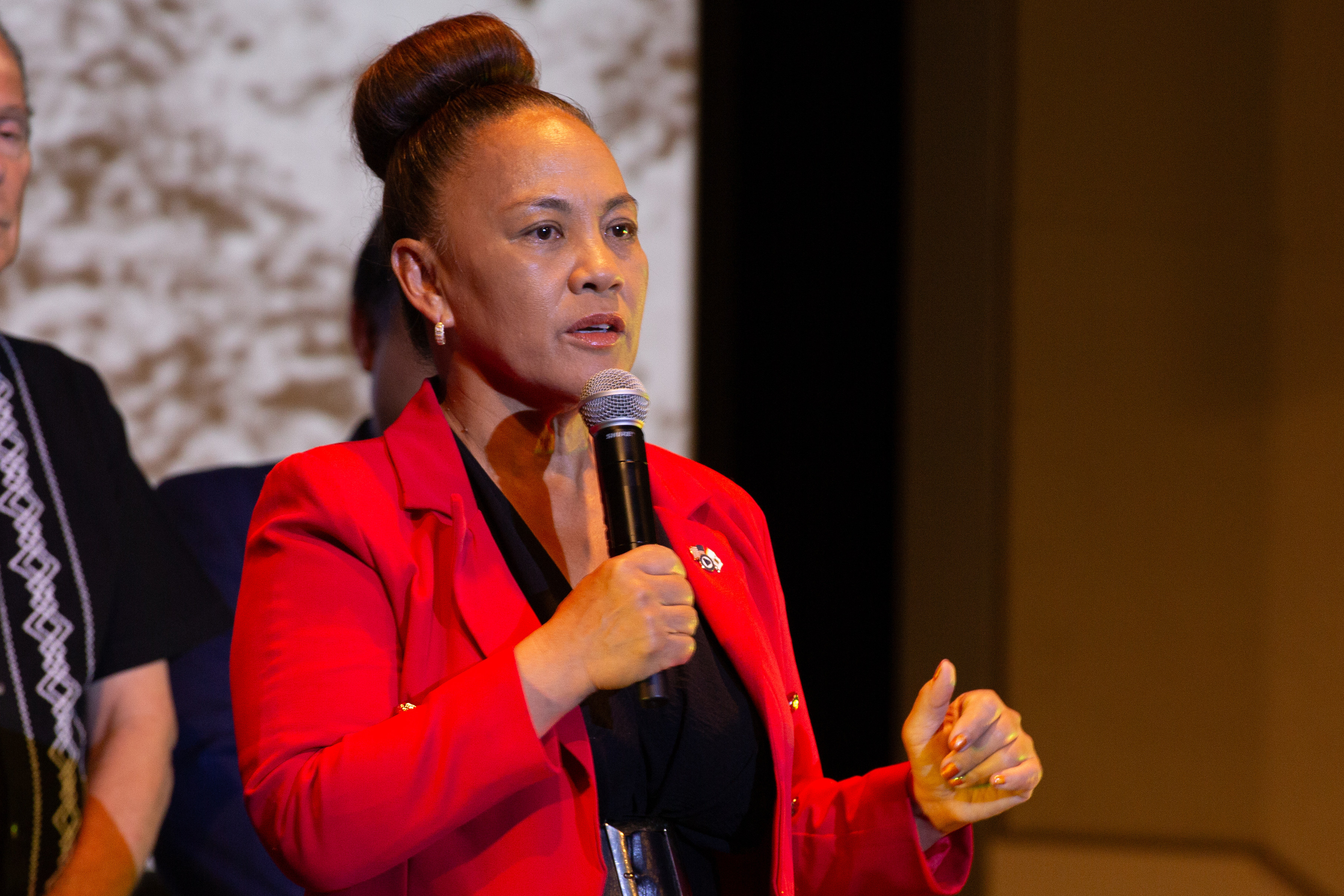 Councilmember Arleen Rojas speaks to the audience during the United...