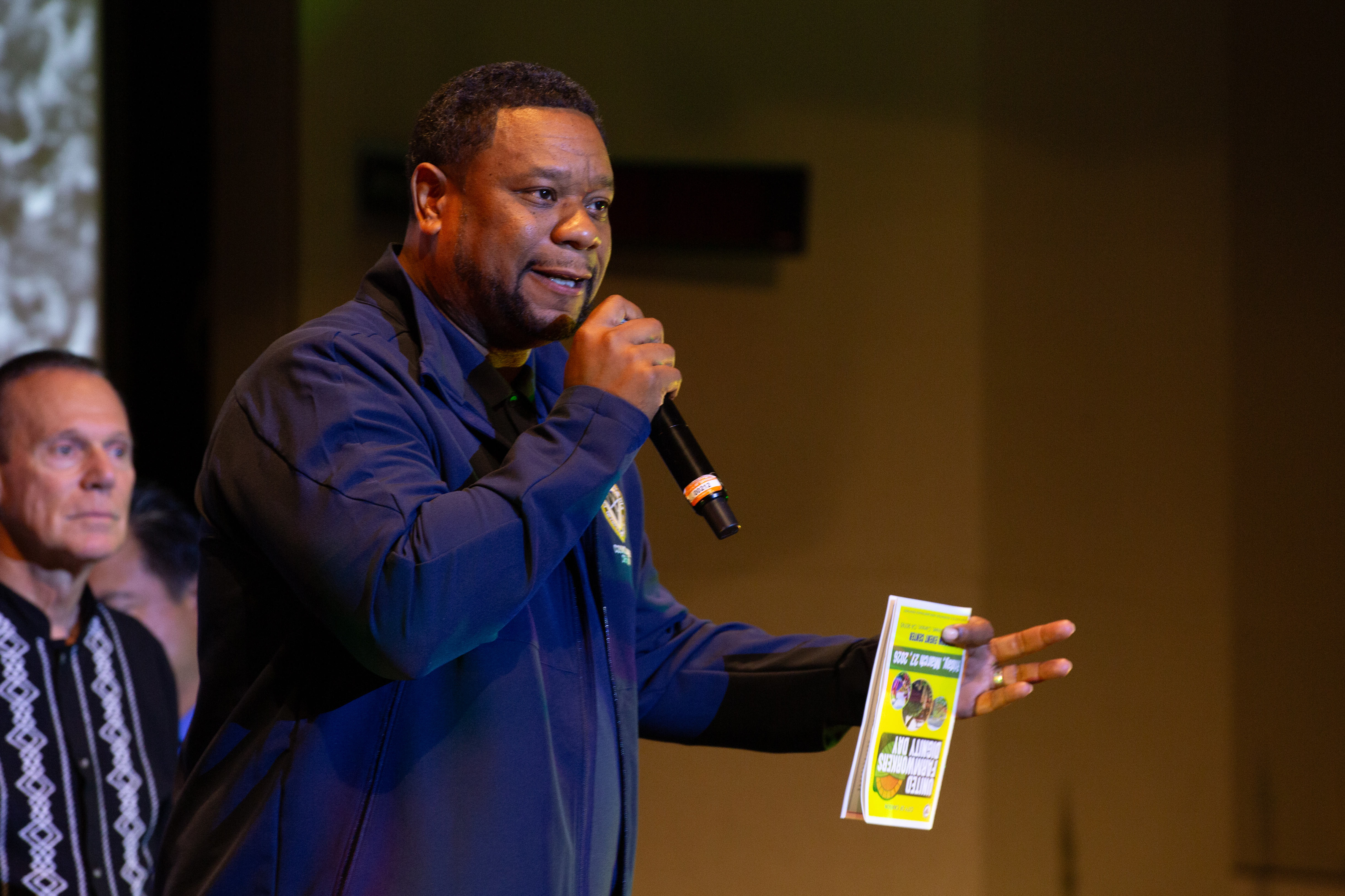 Councilmember Jawane Hilton speaks to the audience during the United...