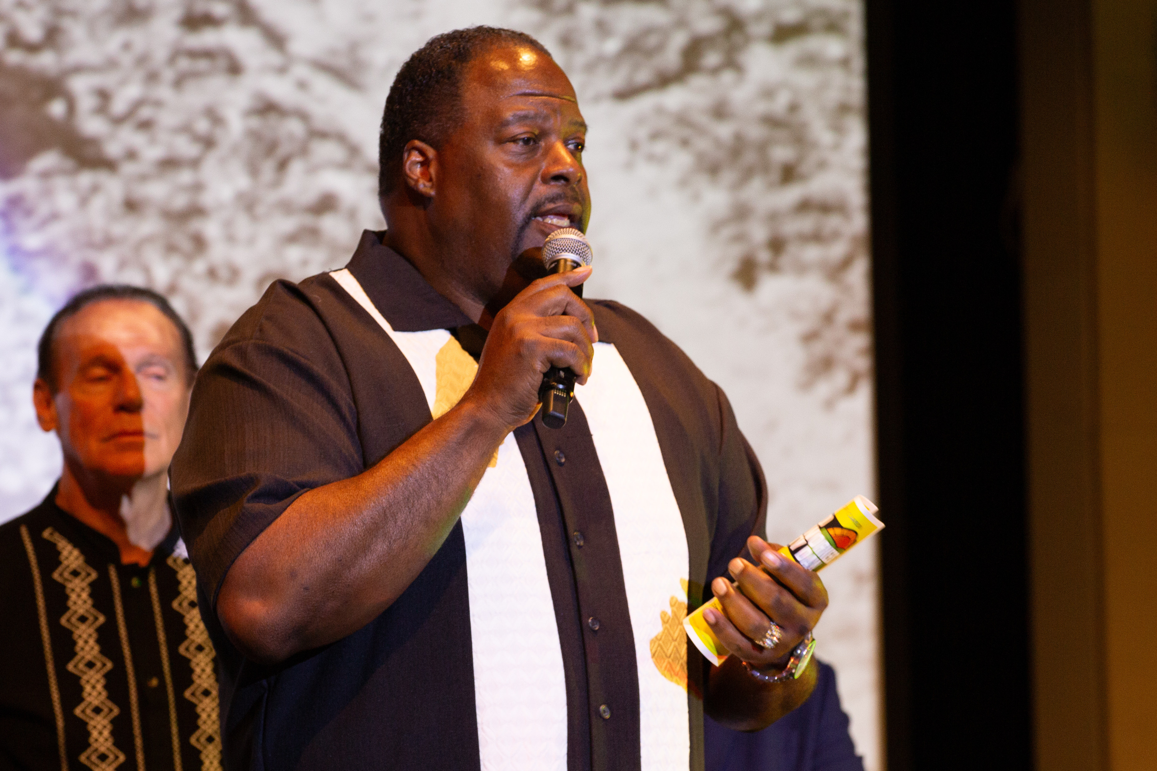 Mayor Pro Tem Cedric Hicks speaks to the audience during...