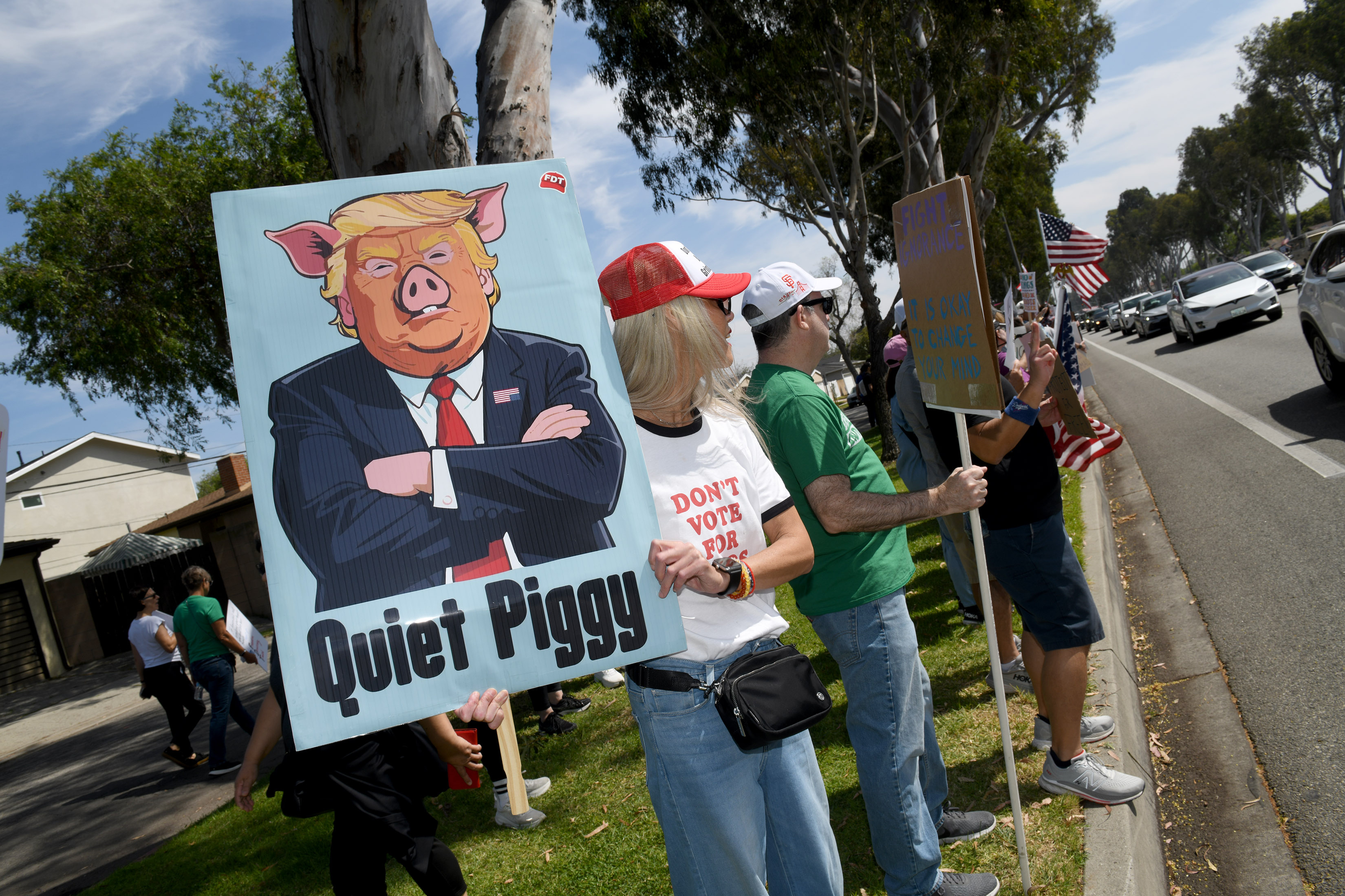 “No Kings” protesters in Torrance express their opposition to the...