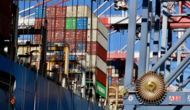 Cargo containers, some damaged, being offloaded from ship at Port of Long Beach after rough voyage – Press Telegram