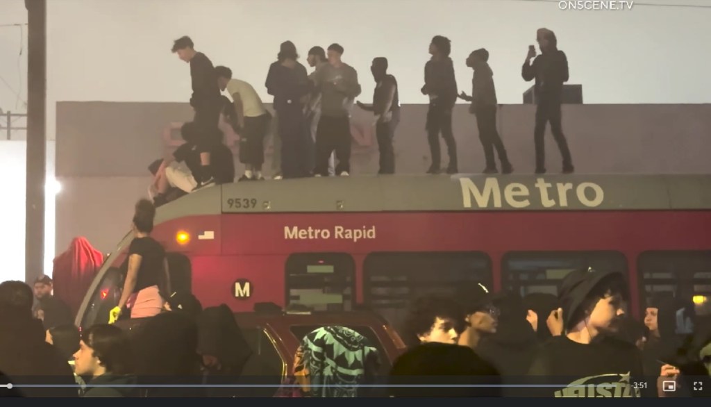 Street takeover crowd includes people climbing on top of trapped Metro bus – Daily Breeze