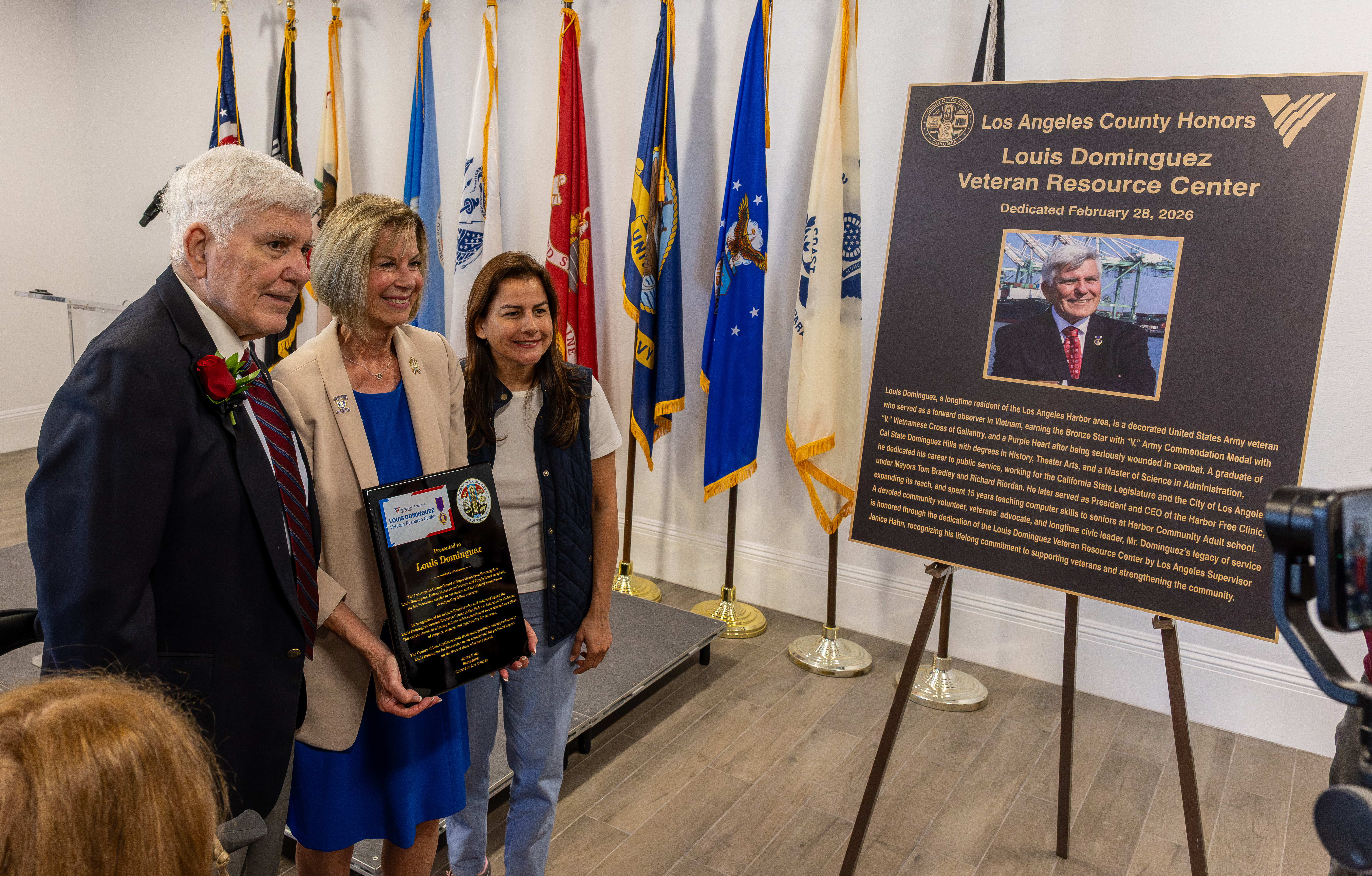Dozens of people gather for a dedication ceremony on Saturday,...