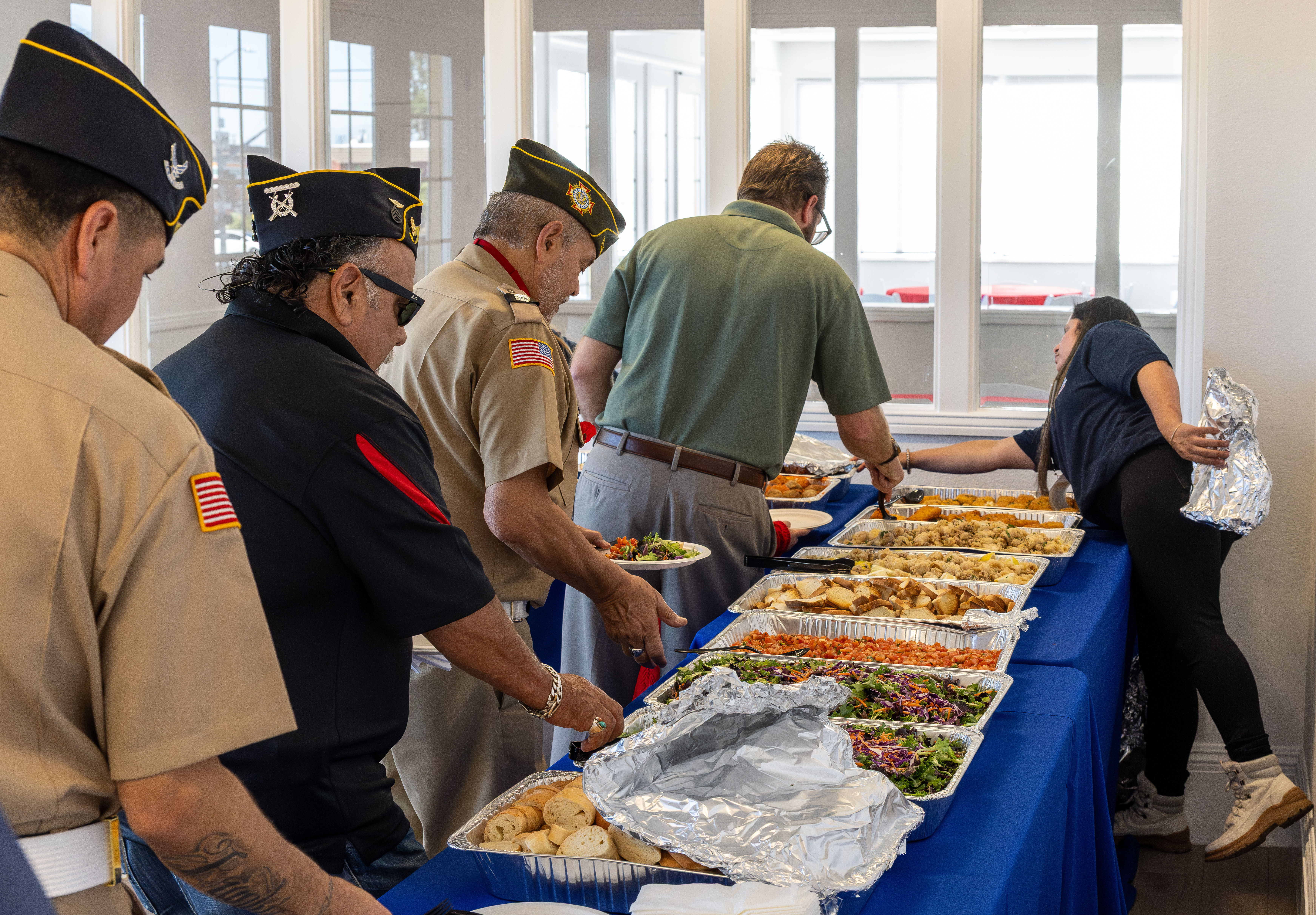 Dozens of people gather for a dedication ceremony on Saturday,...