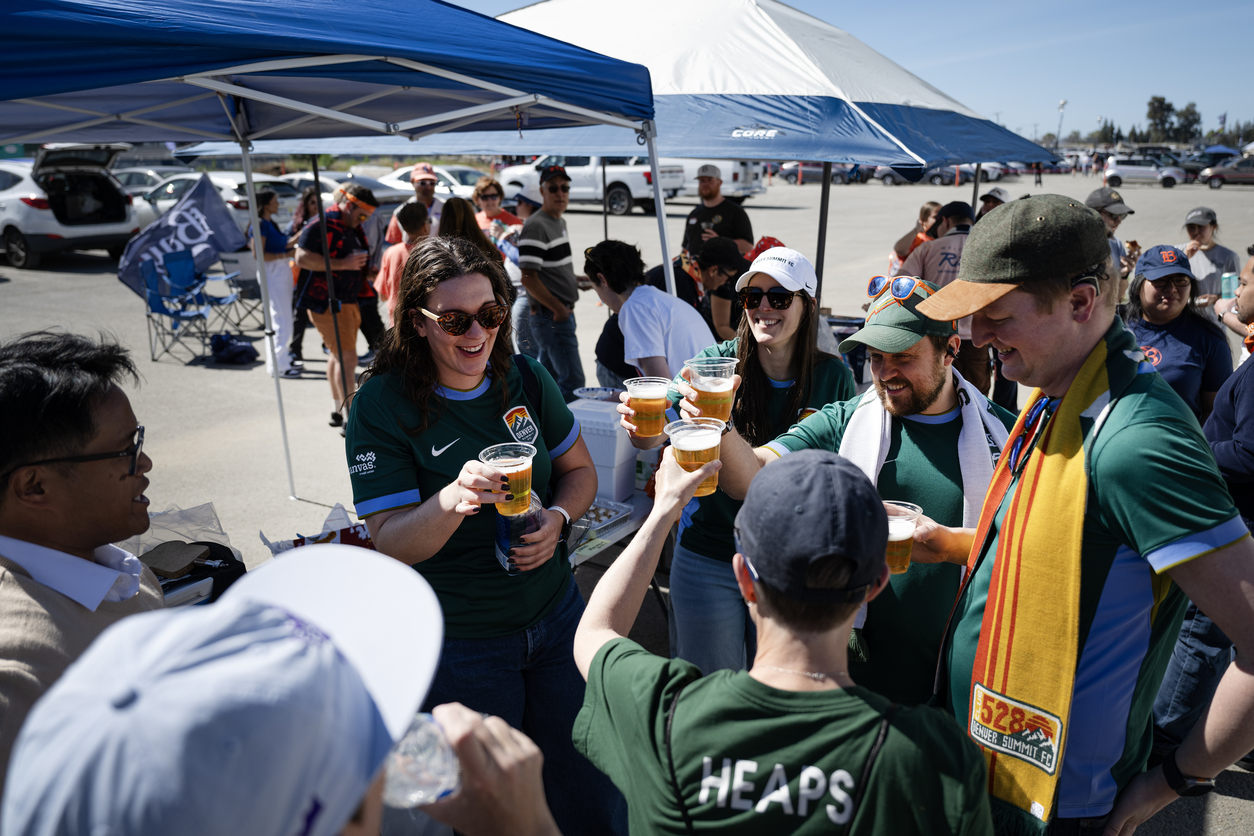 Members of the 14ers Denver Summit FC supporters group are...