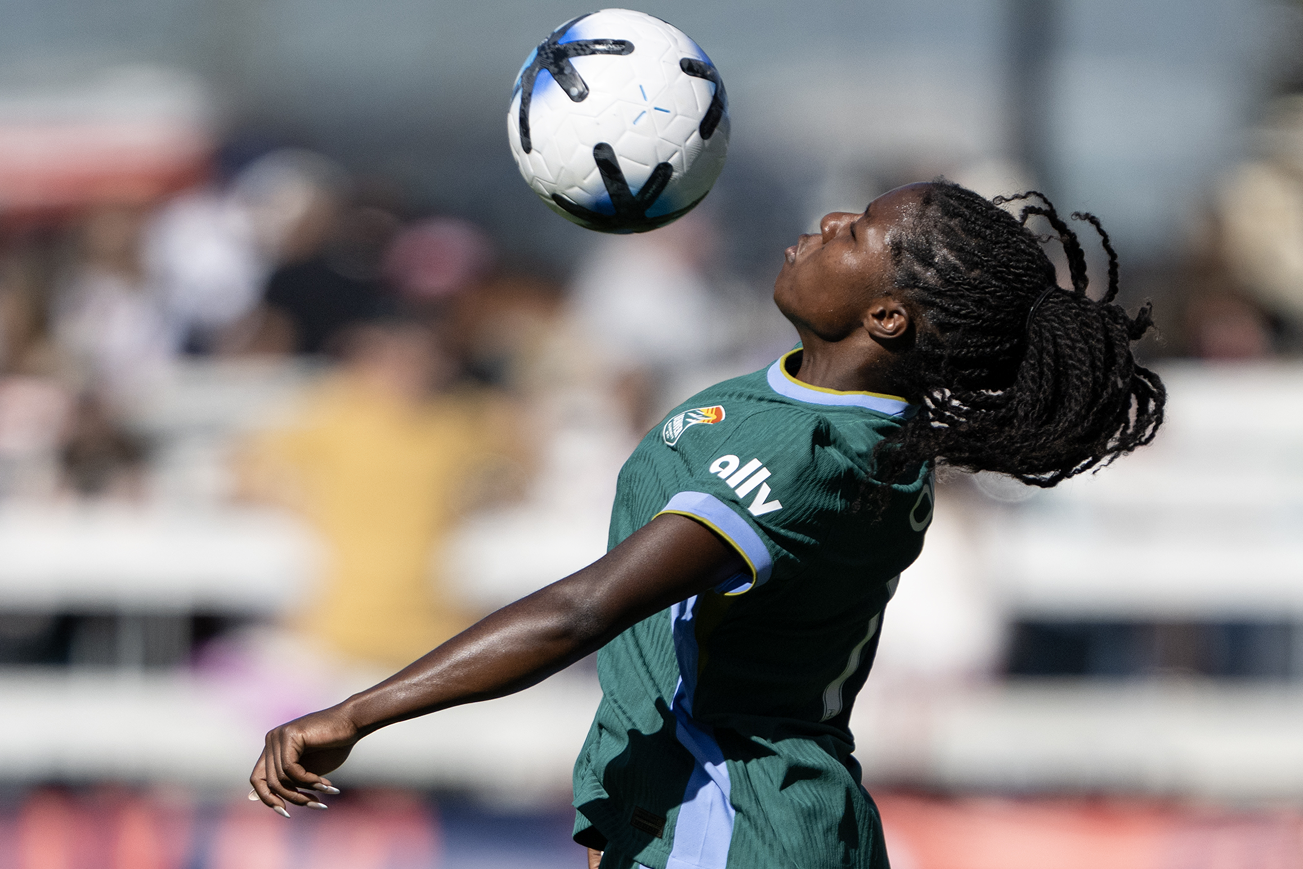 Ayooluwa Oke (7) of the Denver Summit FC gets control...