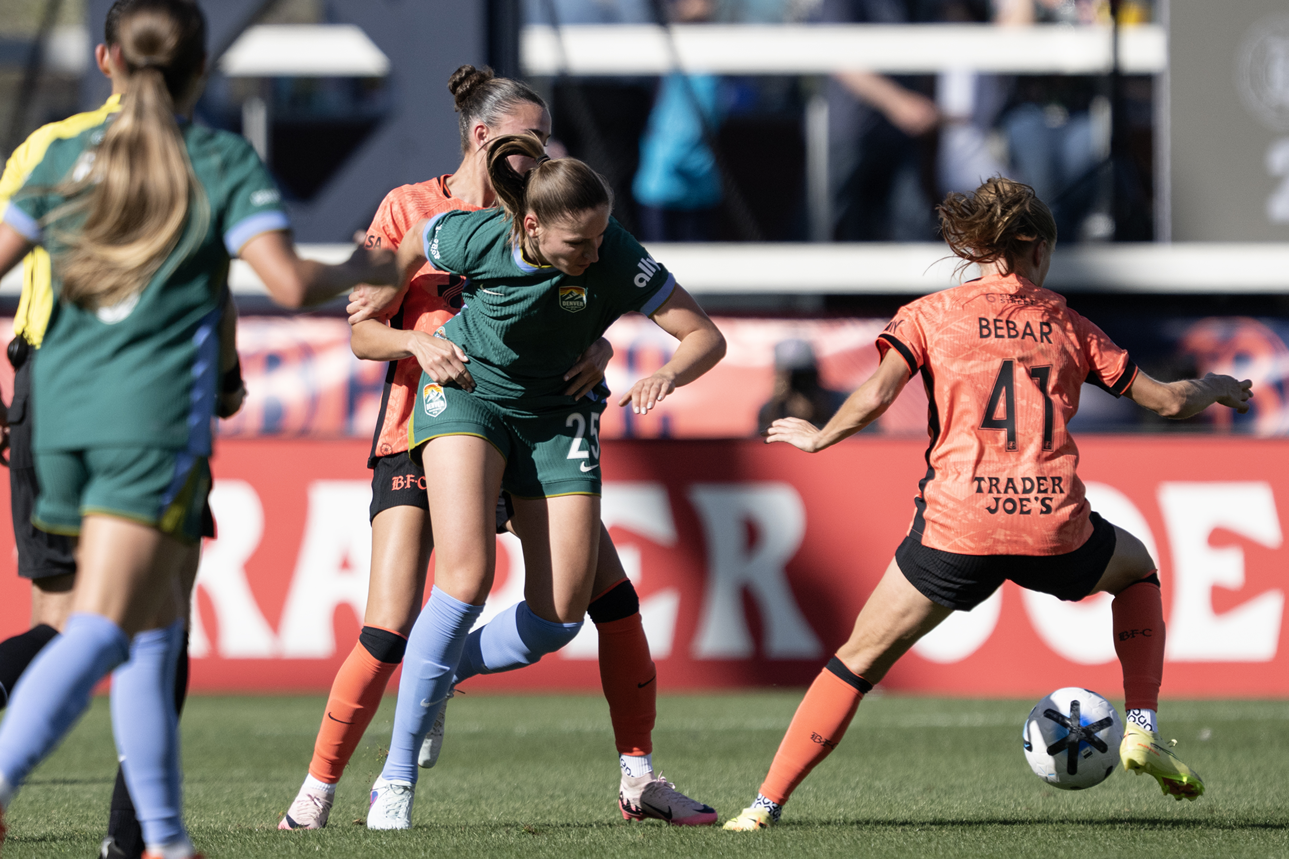 Brooklyn Courtnall (22) of the Bay FC holds Melissa KÃ¶ssler...