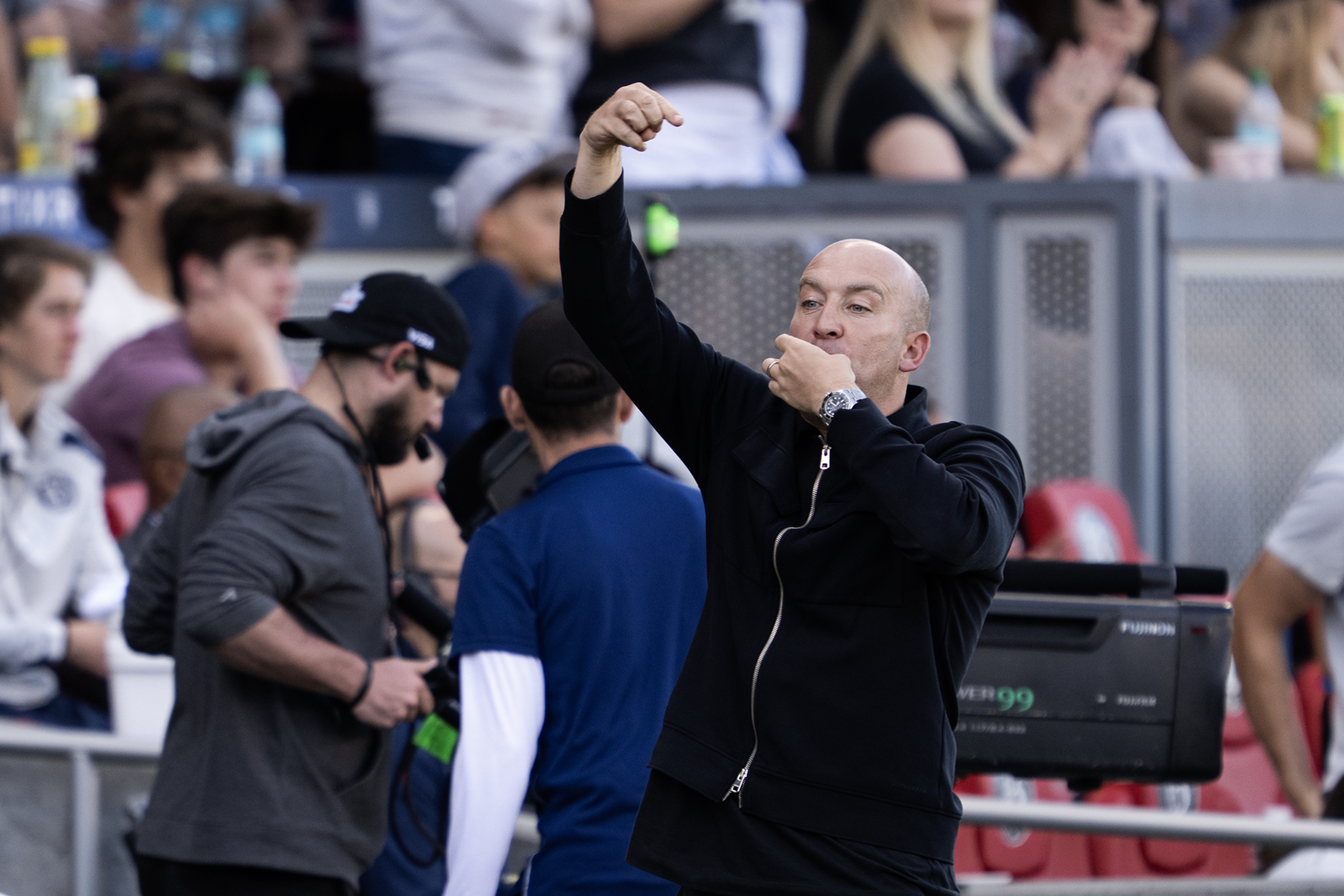 Nick Cushing of the Denver Summit FC whistles to a...