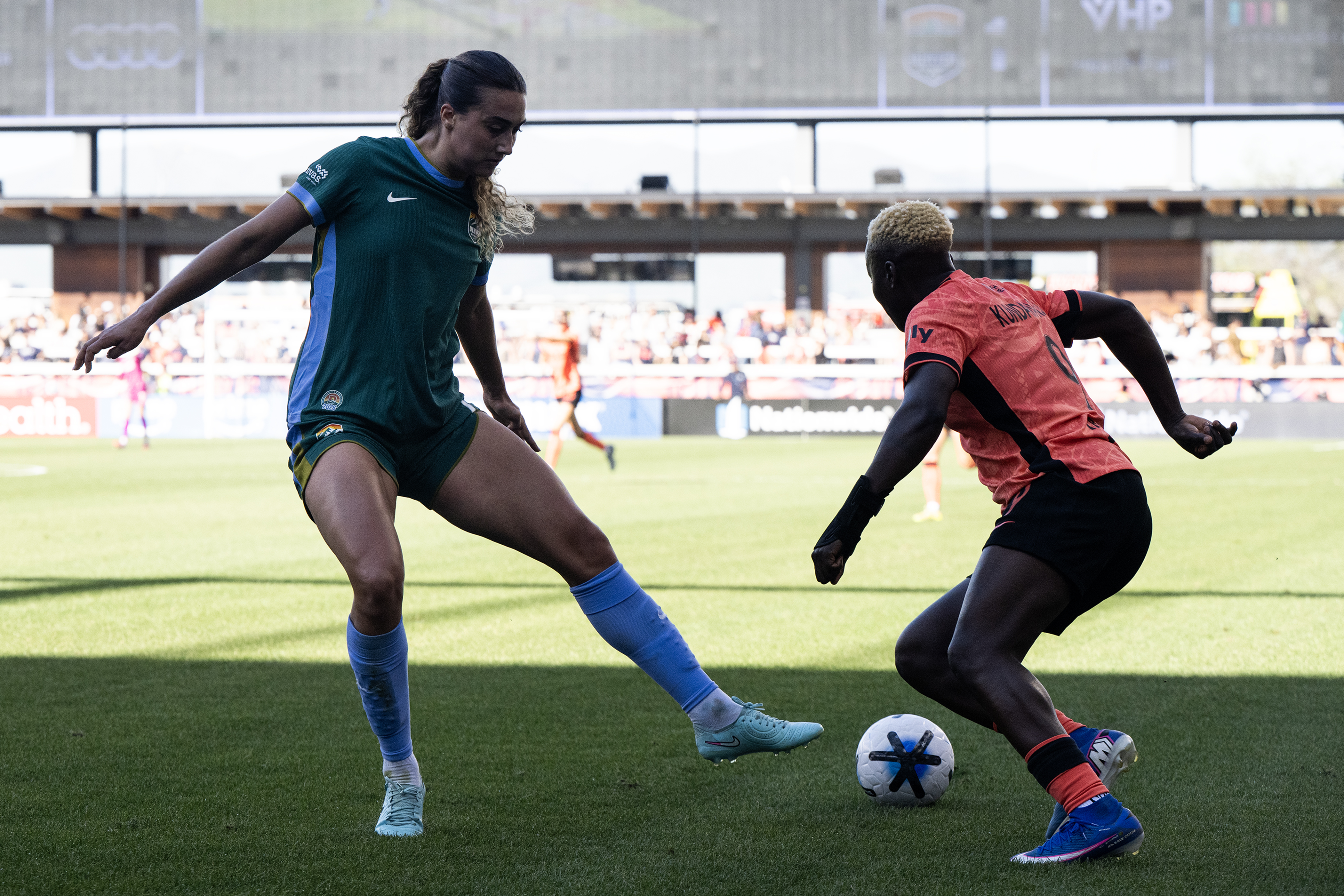Eva Gaetino (23) of the Denver Summit FC loses the...