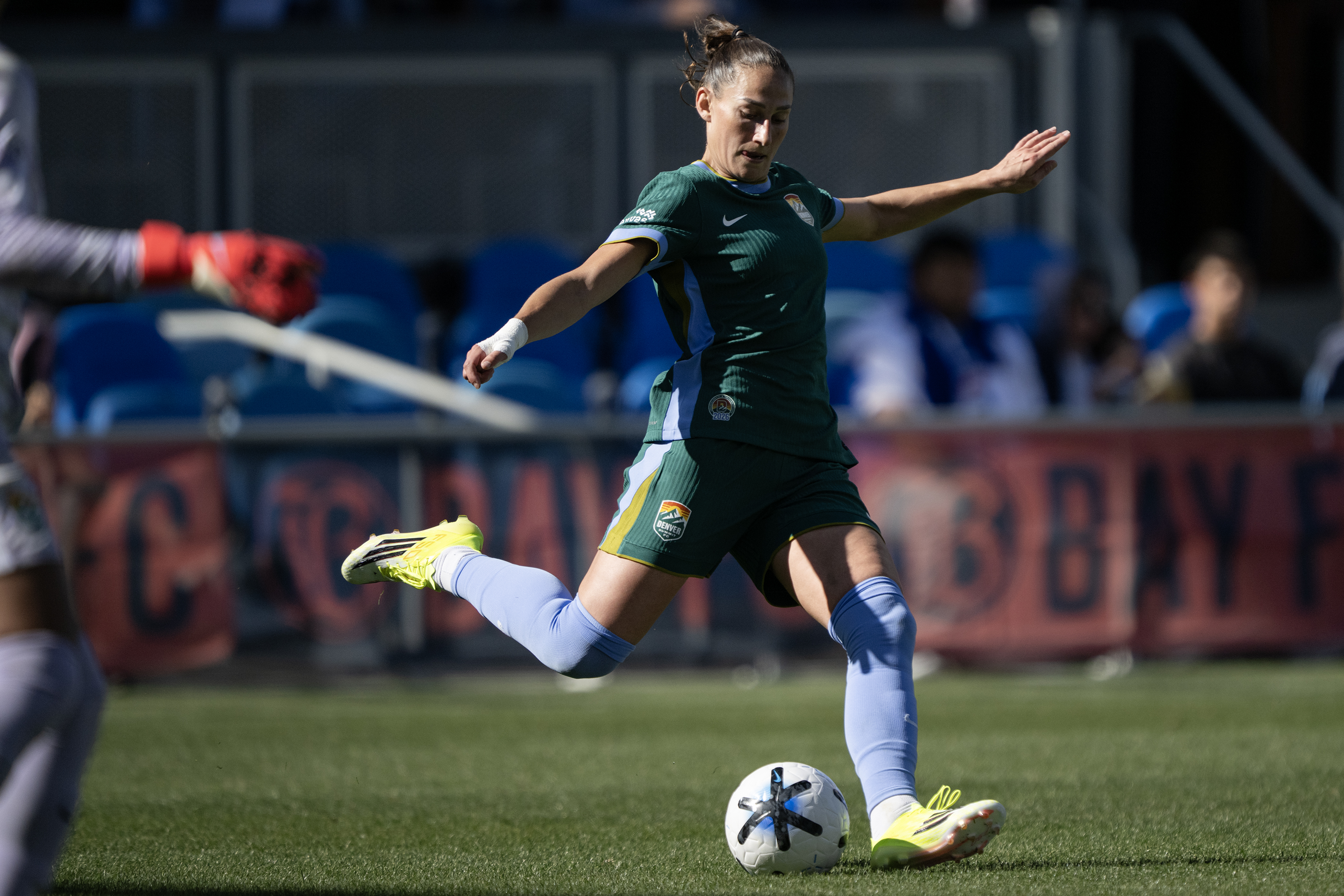 Kaleigh Kurtz (3) of the Denver Summit FC kicks the...