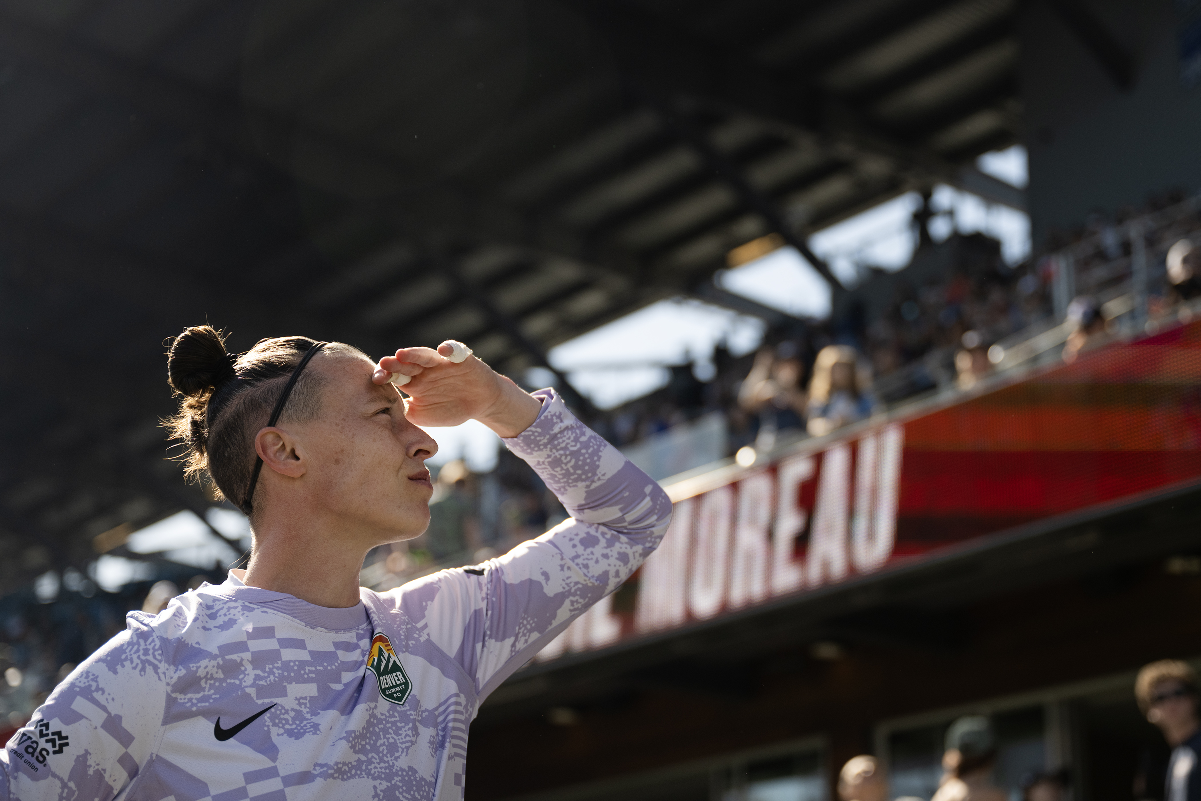 Pauline Peyraud-Magnin (21) of the Denver Summit FC looks into...