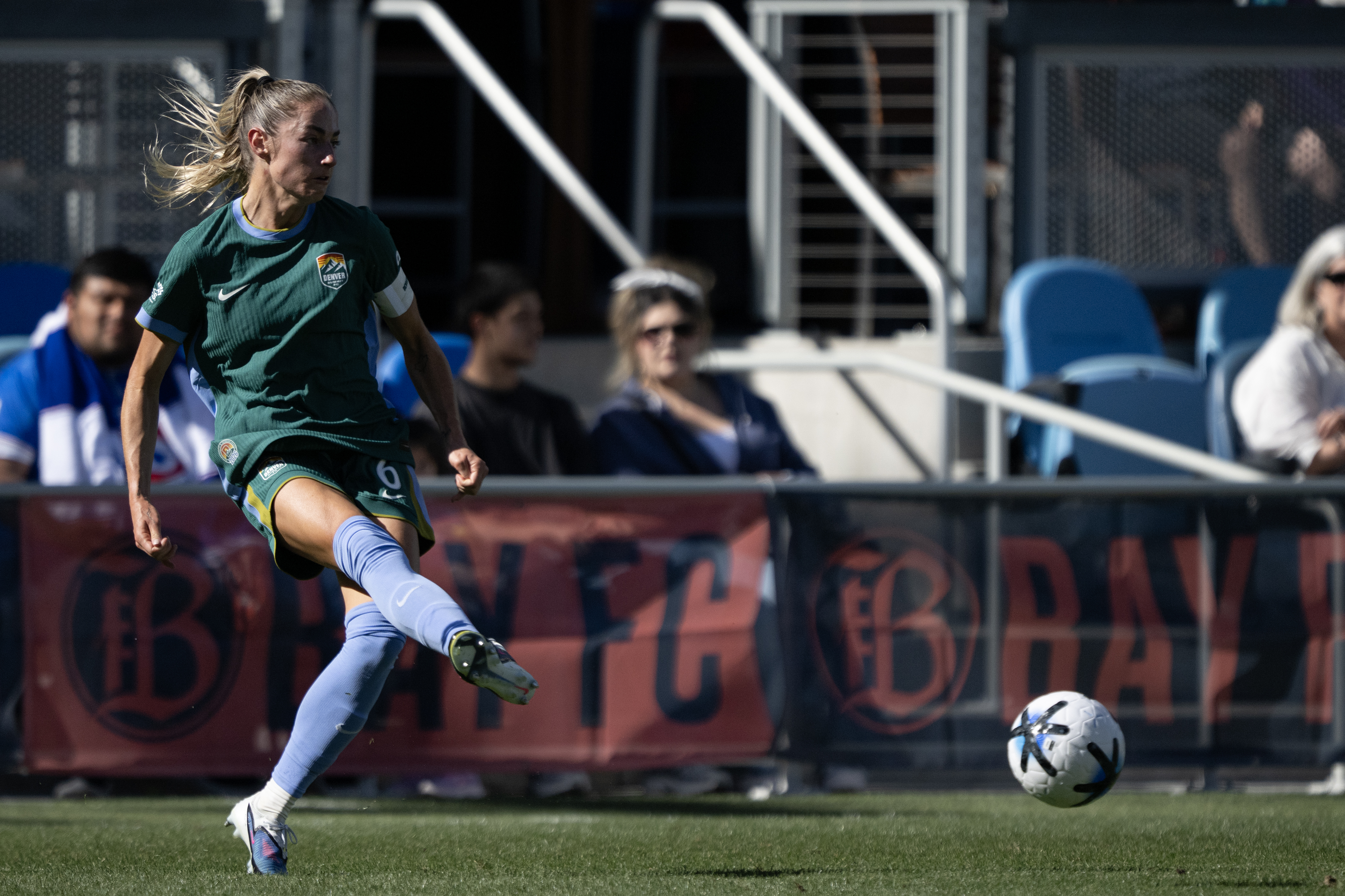 Janine Sonis (6) of the Denver Summit FC passes up-field...