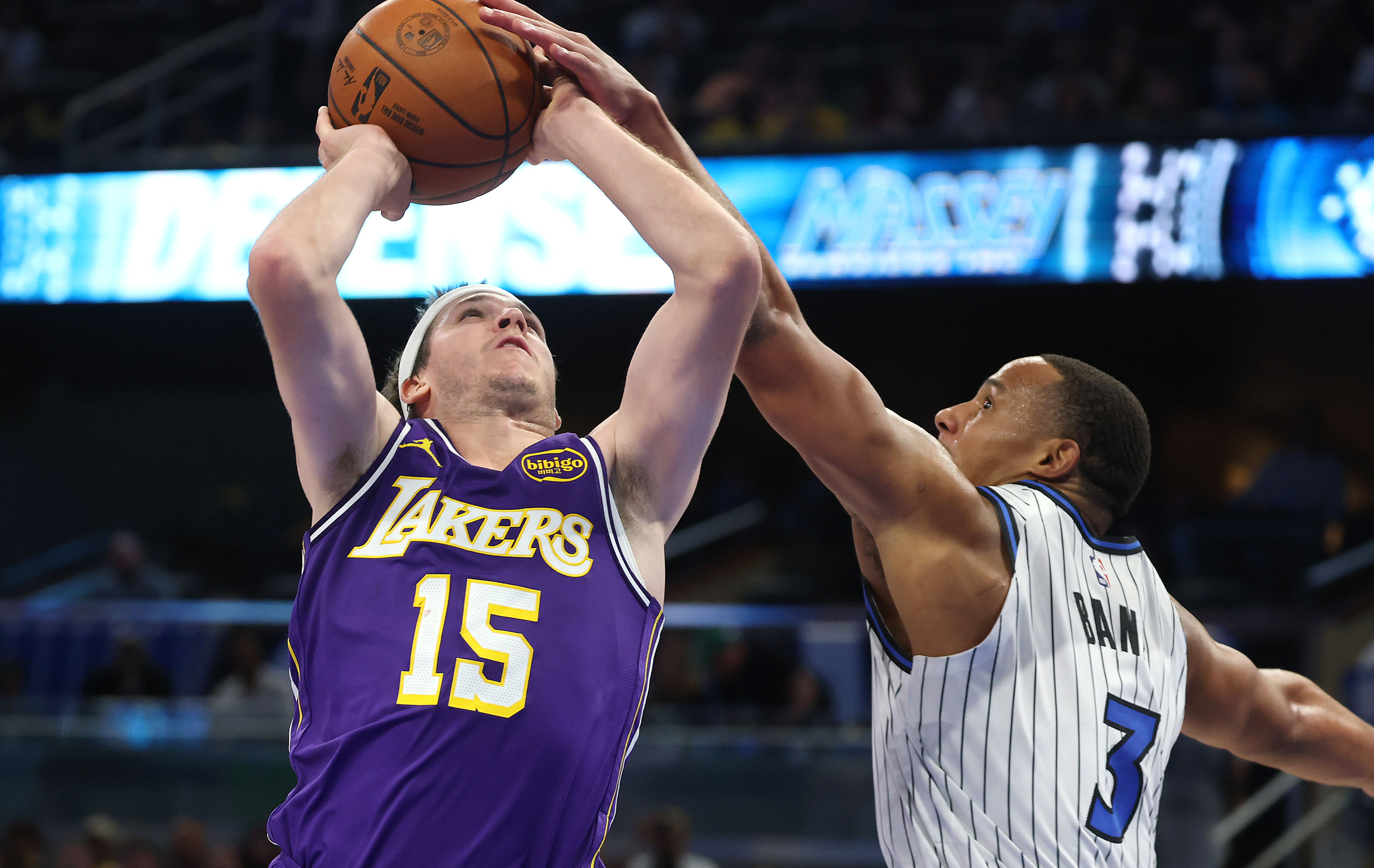 Orlando guard Desmond Bane (3) gets a hand on the...