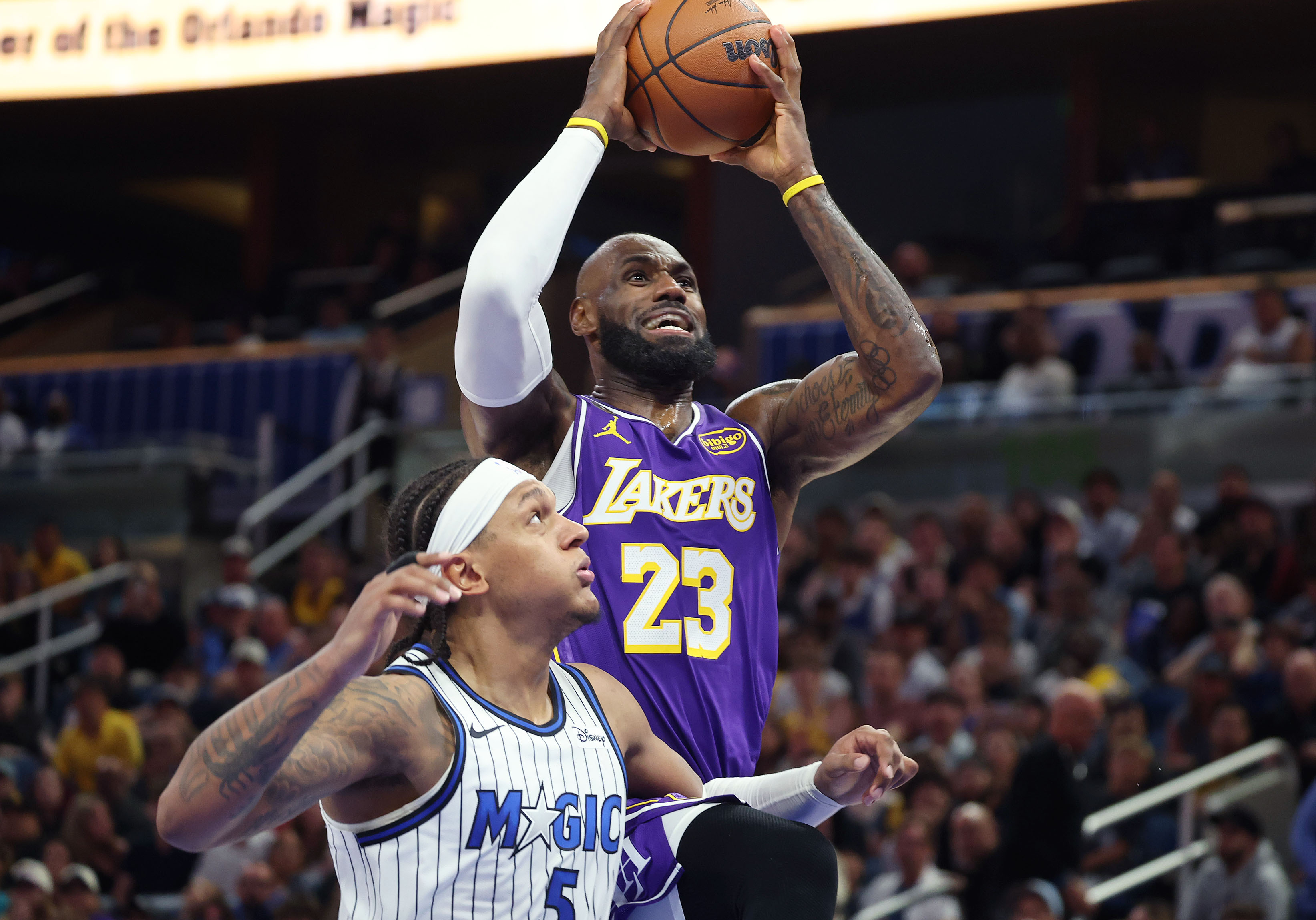 LA forward LeBron James (23) shoots over Orlando forward Paolo...