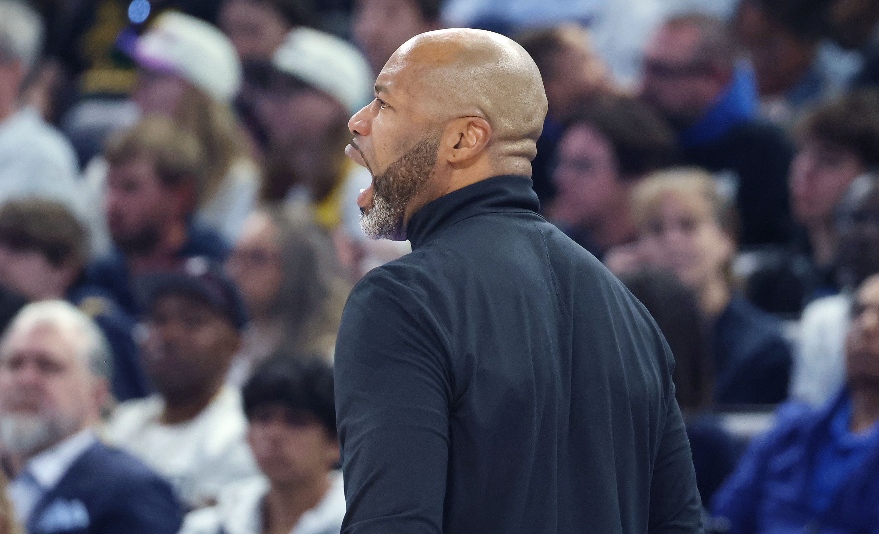 Orlando coach Jamahl Mosley yells during the Los Angeles Lakers...