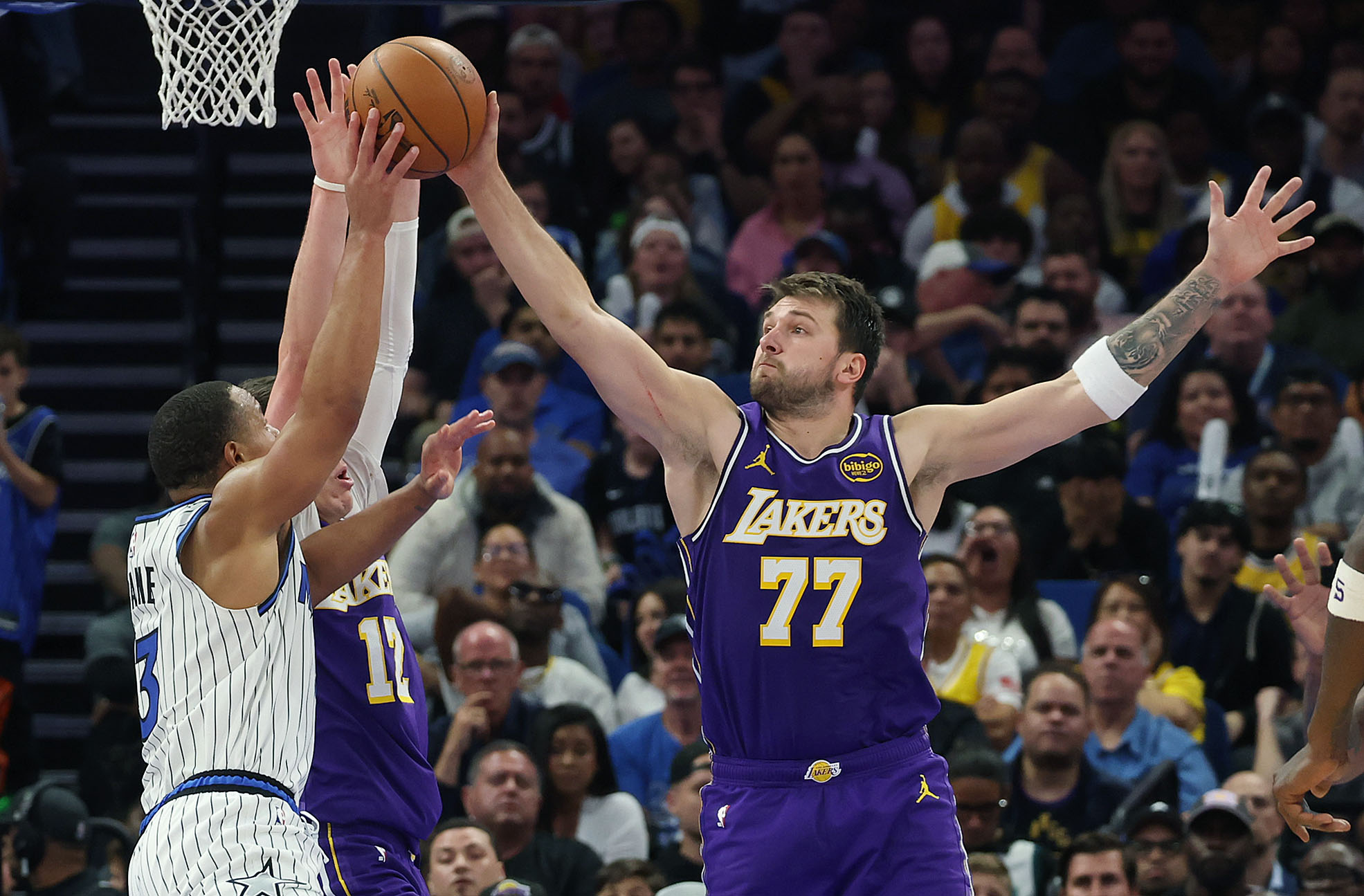 Orlando guard Desmond Bane (3) gets a hand on the...