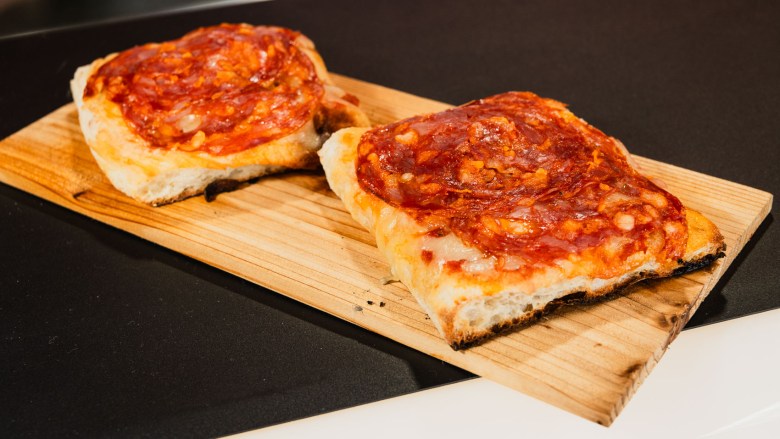 Pizza slices on sale at Gusto Deli & Bistro. (Photo by Thomas Murphy/Times of San Diego)