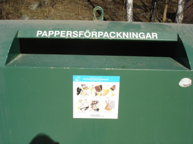 In Stockholm, Sweden, there are recycling bins for every type of recycling including batteries every few blocks. This one is for cardboard and packing materials. (Inga)
