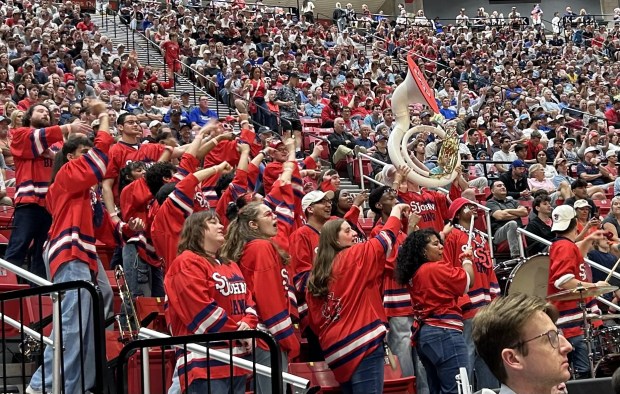 St. John's band members try to distract Kansas players at the free-throw line. (Kirk Kenney / San Diego Union-Tribune)