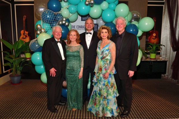 Event honorees Steve Baum and Brenda Baker, La Jolla Music Society President and Chief Executive Todd Schultz, event chairwoman Susan Hoehn and Bill Hoehn attend the Music Society's WinterFest Gala on Feb. 21. (Vincent Andrunas)