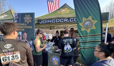 Public members speak with VSP recruiters at the Fresno Support Blue Run.