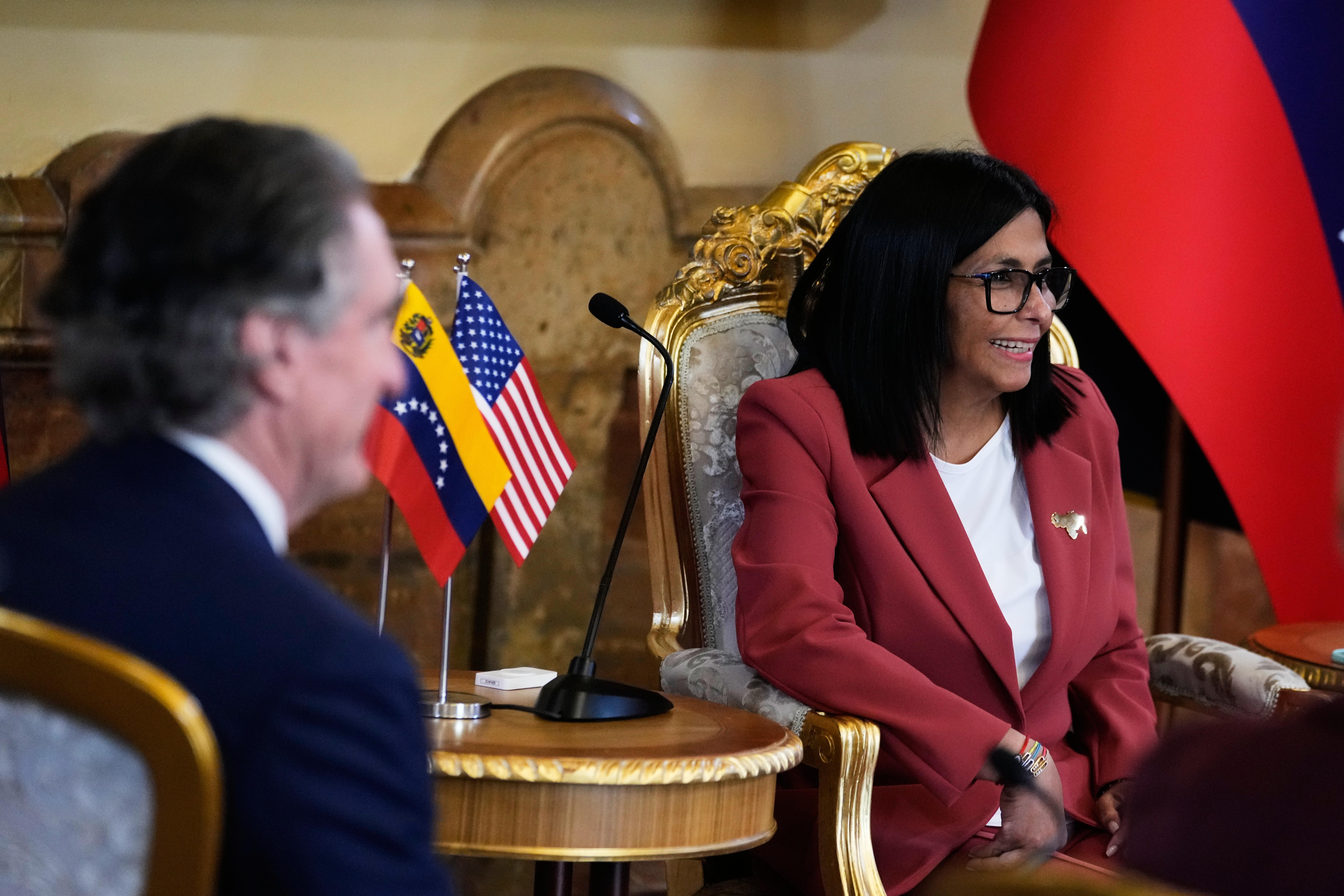Venezuela's acting President Delcy Rodriguez and U.S. Interior Secretary Doug Burgum meet.