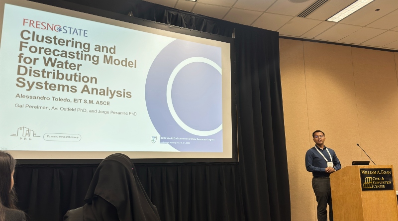Alessandro Toledo presents at a conference on "Clustering and Forecasting Model for Water Distribution Systems Analysis".
