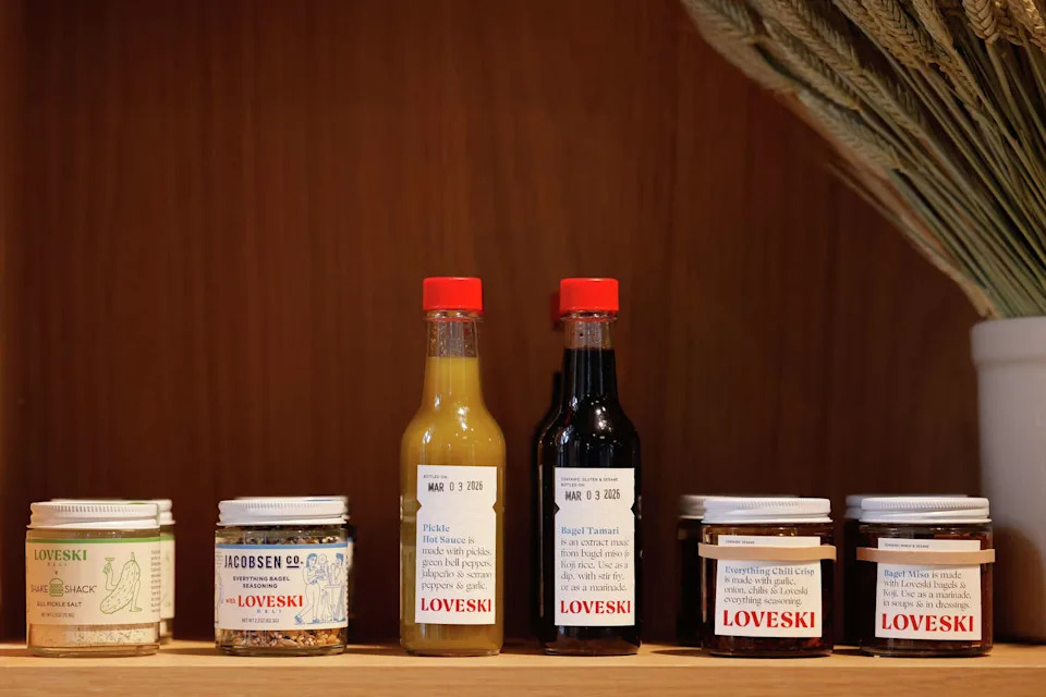 Loveski has an expansive "larder section," filled with Kostow's own pantry creations, like tamari and miso made out of bagels, pickle hot sauce, and everything bagel chili crisp. (Lea Suzuki/S.F. Chronicle)