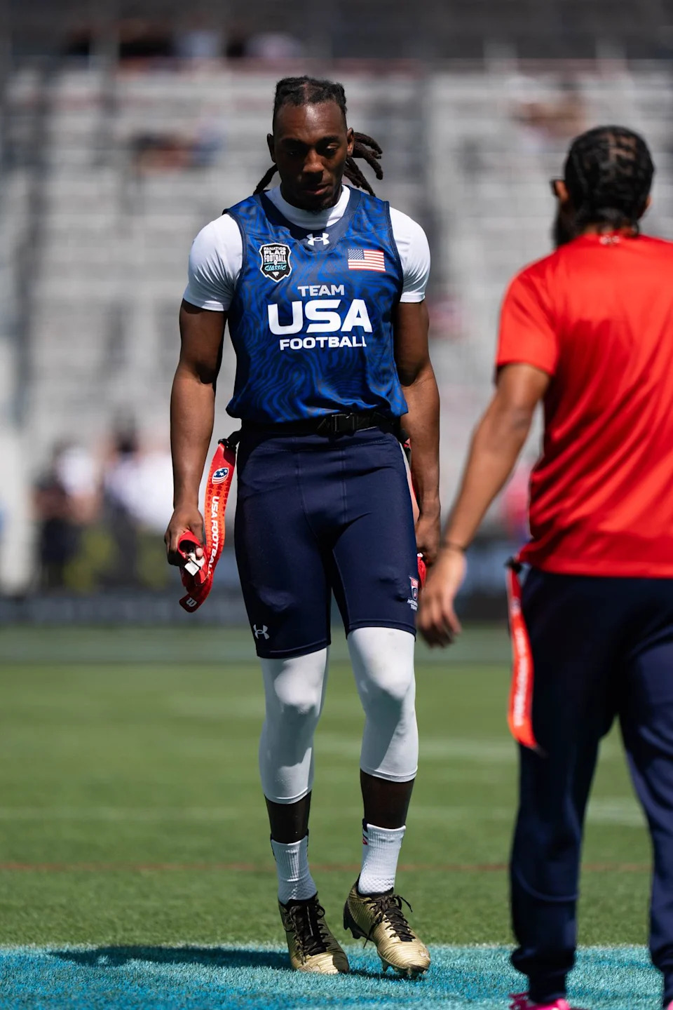 A Team USA player warms up ahead of the Fanatics Flag Football event, March 21, 2026, in Los Angeles.