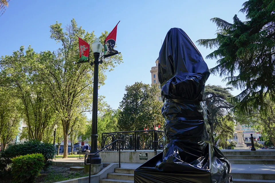 The statue of Cesar Chavez remains covered in the Cesar E. Chavez Plaza on Friday, March 20, 2026, in Sacramento, CA.