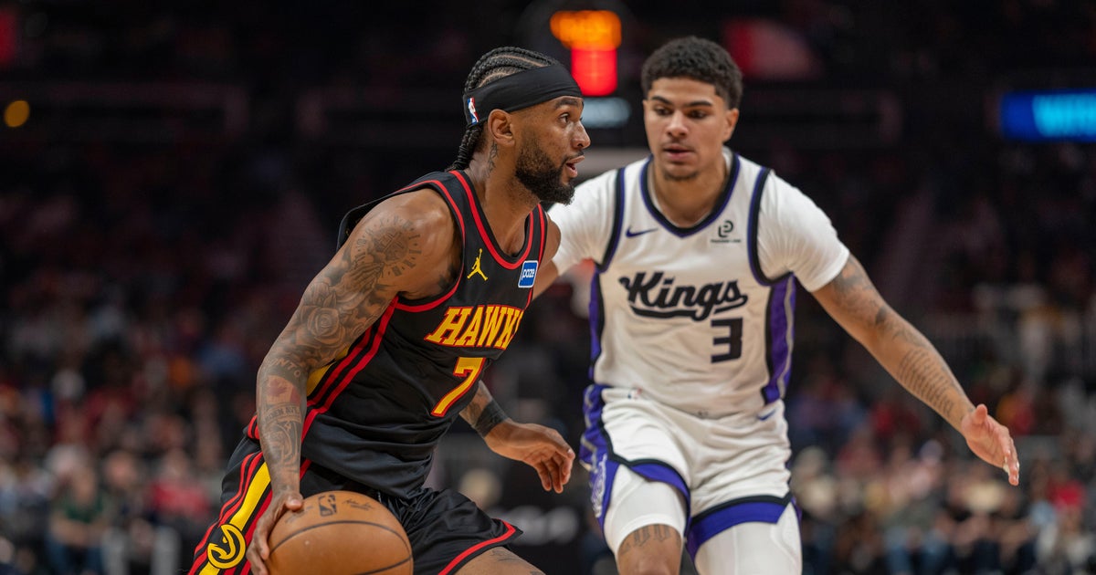 Hawks withstand fourth-quarter surge by Kings in 123-113 victory as Snyder gets 500th win