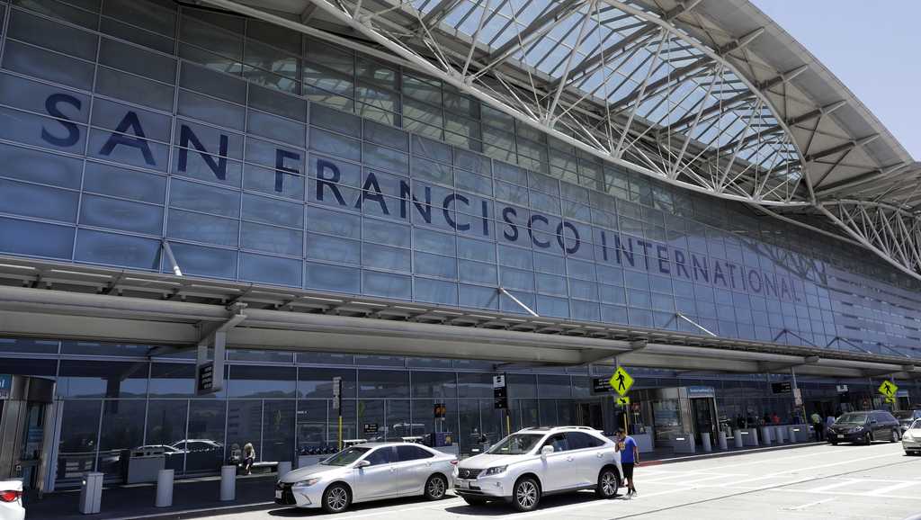 ICE agents restrain woman in front of her child at SFO, sparking outrage