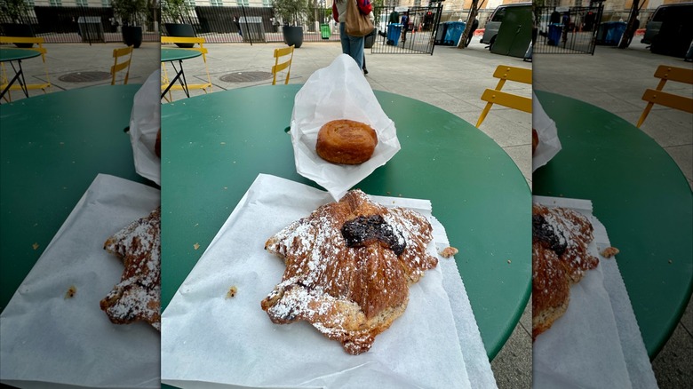 Blackberry, almond, hazelnut croissant, and kouign-amann on a table