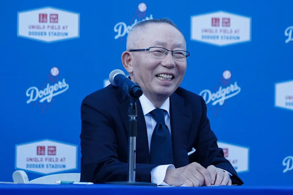 UNQILO founder Tadashi Yanai laughs during a UNIQLO partnership press conference on March 25, 2026 in Los Angeles, California.