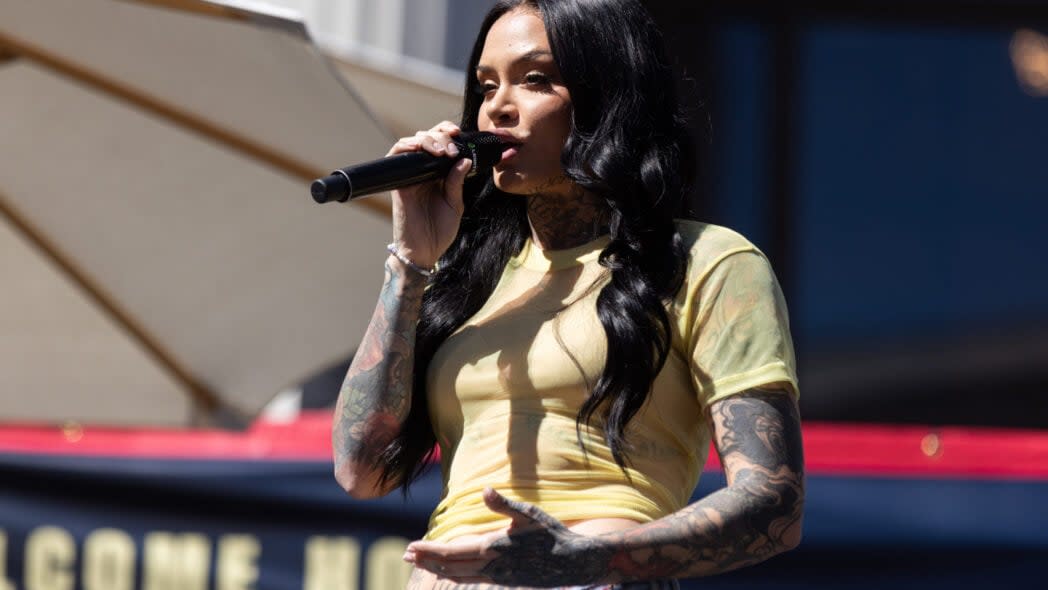 Musical artist Kehlani sings at a rally celebrating Olympic gold medalist Alysa Liu’s accomplishments at the Milano Cortina 2026 Olympics on March 12, 2026 in Oakland, California. Liu won the United States first gold medal in women’s singles figure skating since 2002. (Photo by Benjamin Fanjoy/Getty Images)