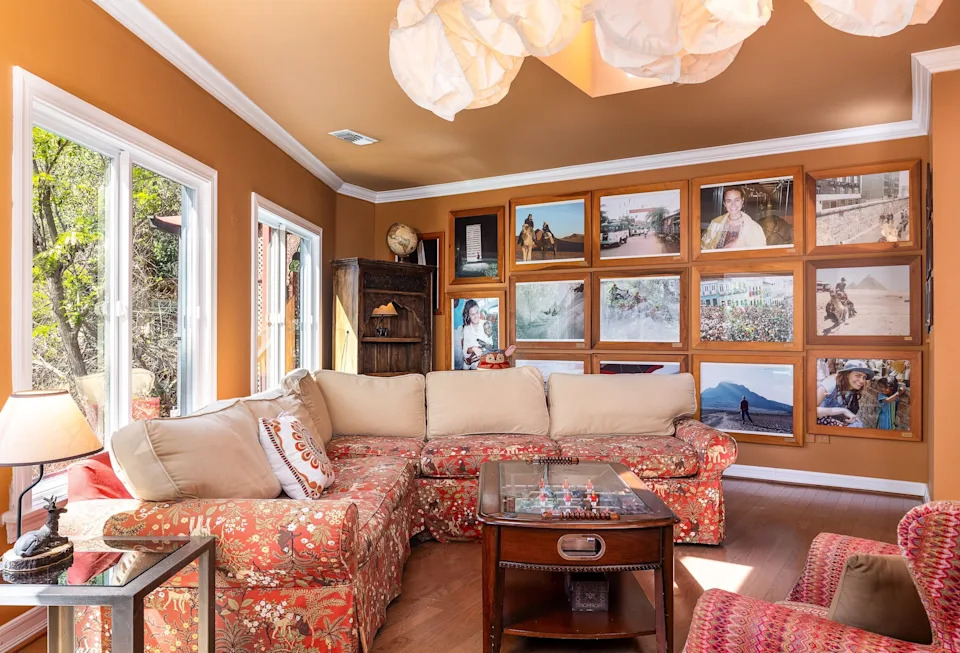 Farr appreciated the various textures, vibrant colors, and dark woods used in the home's interior design, but added her personal touch as soon as she moved in.