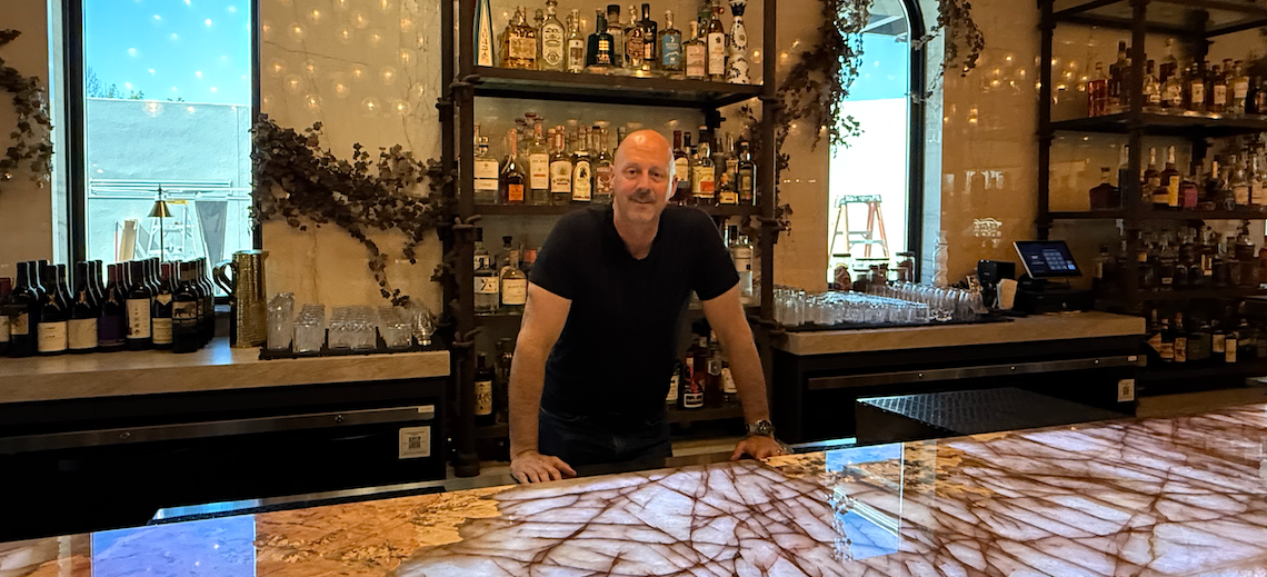 man behind a bar