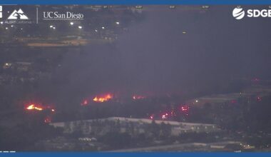 Brush fire burns in riverbed in Santee