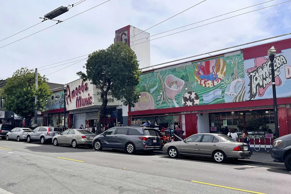 A film crew shoots inside Amoeba Music on March 27, 2026. (Timothy Karoff/SFGATE)