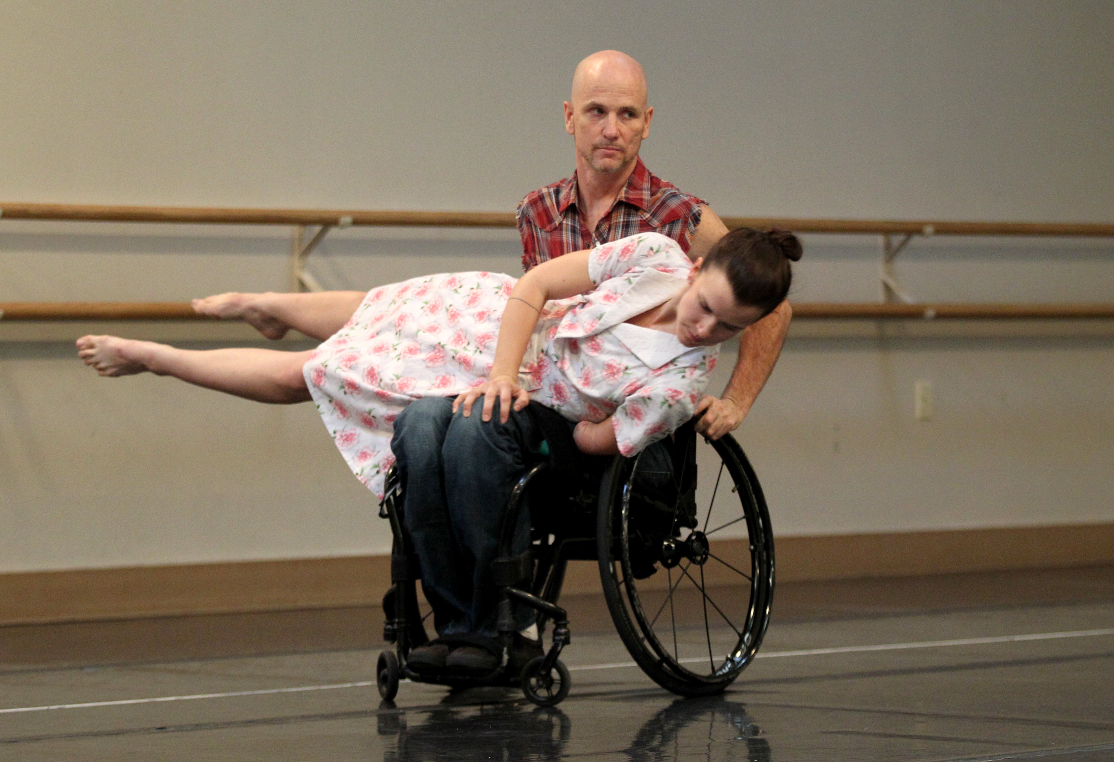 Dwayne Scheuneman and Julie Crothers dance during a performance by...