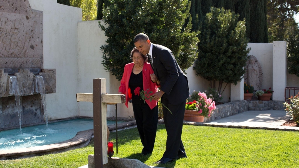 President Barack Obama and Helen Chavez place a rose at the gravesite of Cesar Chavez before the dedication ceremony for the Cesar E. Chavez National Monument in Keene, Calif., Oct. 8, 2012. (Official White House Photo by Pete Souza)