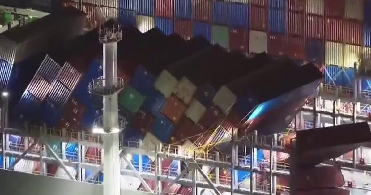 Cargo ship at Port of Long Beach under watch after containers damaged in rough seas