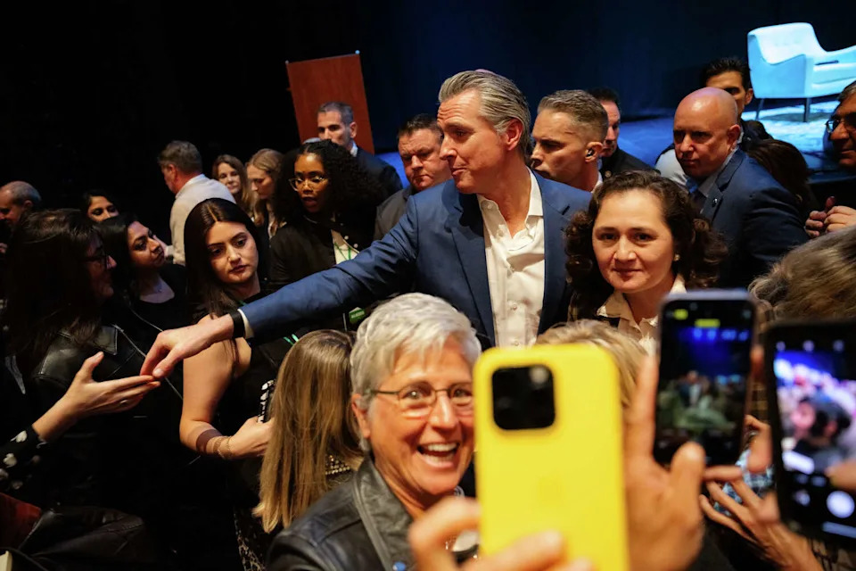 Gov. Gavin Newsom greets the audience after presenting his new book "Young Man in a Hurry" at the Golden Gate Theatre in San Francisco, Feb. 28, 2026. (Manuel Orbegozo/For the S.F. Chronicle)