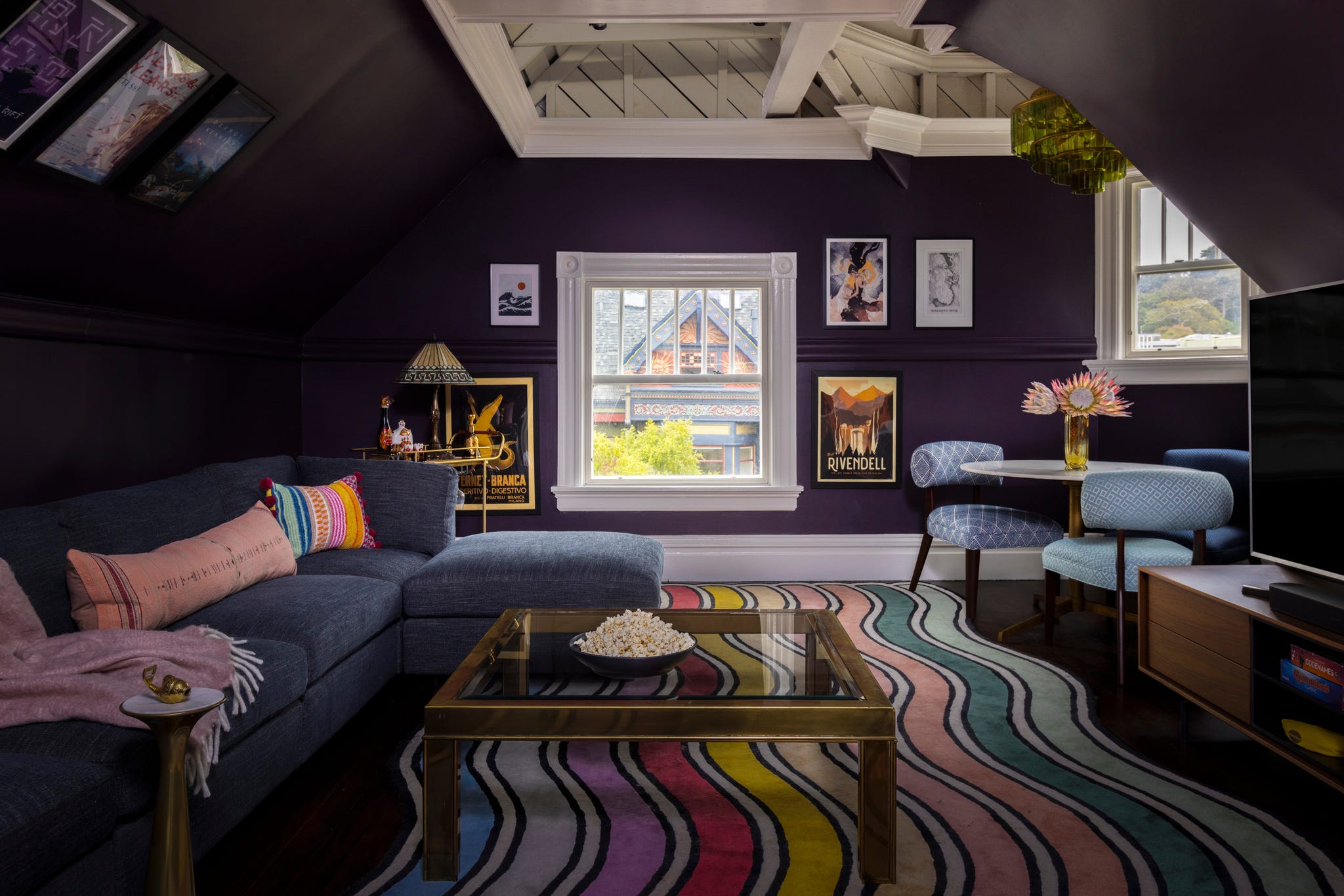 Cozy living room with colorful decor and furniture.